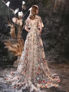 Embrace your inner flower child with the Myra Floral Embroidered Gown! This A-line dress has stunning vintage vibes and is perfect for any special occasion. Made with high-quality tulle and exquisite embroidery, this floor-length design is both beautiful and fashionable. Say yes to the dress and add a touch of elegance to your wardrobe! Specifications: Fabric Type: Lace/Tullu is_customized: Yes Decoration: Embroidery Decoration: Lace Built-in Bra: Yes ** For a better fit, it is recommended to ta Floral Embroidered Gown, Say Yes To The Dress, Embroidery Decoration, Yes To The Dress, Say Yes, Flower Child, Vintage Vibes, Top Dress, Winter Wear