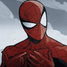 a spider - man with his hands together in front of him