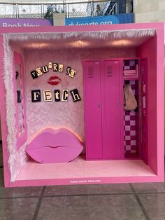 the pink room is decorated like a barbie's bedroom and has an open door