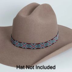 Crafted with high-quality materials and intricate beadwork, this hat band is a statement piece that will add a touch of rugged sophistication to any hat. The warm brown tones and rustic design make it a versatile choice for any occasion, whether you're hitting the rodeo or simply want to add a bit of western flair to your everyday look.**Please note this is the hatband only** Southwestern Beaded Adjustable Hat, Southwestern Adjustable Beaded Hat, Southwestern Style Adjustable Beaded Hats, Beaded Adjustable Hat For Rodeo, Adjustable Beaded Hat Bands, Artisan Beaded Adjustable Hats, Adjustable Hat Band With Bead Caps For Festival, Adjustable Beaded Hat For Country Events, Adjustable Bead Cap Hat Bands For Festival