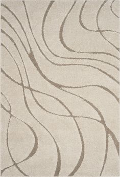 a white rug with wavy lines on it