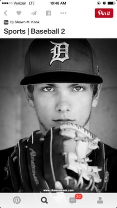 a black and white photo of a baseball player