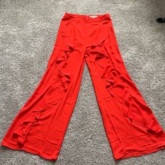 Coral High Waisted Wide Leg Pants Ruffle Down Each Leg Never Worn New With Tag Red High Waist Bottoms For Going Out, Chic Red Bottoms For Going Out, Elegant Red Flare Bottoms, Red High Waist Wide Leg Summer Pants, Fitted Red Bottoms With Ruffles, Chic Red Bottoms For Party, Chic Red Spring Bottoms, Chic Red Bottoms For Spring, Elegant Red Bottoms With Ruffles