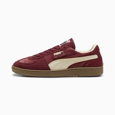 Back in an array of vivid colour schemes, the PUMA Super Team is modeled on the 1982 Handball World Championship trainer worn by the German national team. The original Super Team was crafted with a full suede upper, locking down the shoe’s classic styling. Originally a design feature to stand up to the rigors of the sport, contrast stitching in the midsole became one of the shoe’s most distinctive and standout features.. Visit our page to learn more about our regal red PUMA Super Team Velvet Sne Red Sneakers Women, Red Puma Shoes, Puma Shoes Women, German National Team, Almond Chocolate, Velvet Sneakers, Chic Heels