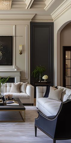 a living room with couches, chairs and a coffee table in front of a fireplace