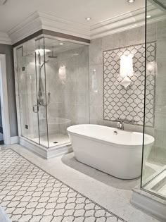 a bathroom with a tub, shower and tiled floor