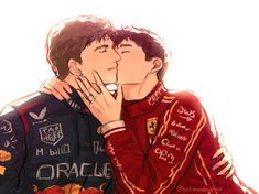 two people kissing each other with their hands on their face and one person wearing a racing suit