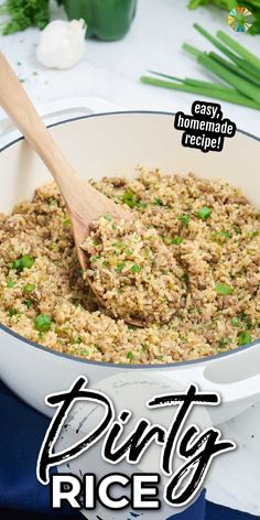 rice in a white pan with a wooden spoon on the side and text overlay that reads dirty rice easy homemade recipe