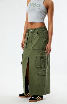 The PacSun Olive Cargo Midi Skirt is a perfect fusion of utility and style. With its chic midi length and functional cargo pockets, this skirt effortlessly combines fashion-forward design with practicality, making it a versatile and on-trend addition to your collection. This high-waisted midi skirt gets finished off with D-loop straps, a flirty front slit, and a raw-cut hem. 


	34.5" center front length
	Stretch fabric
	High-rise
	Zip fly closure
	5-pocket body
	Cargo side pockets
	D-loop straps
	Front slit
	Raw cut hem
	99% cotton, 1% spandex
	Machine washable
	Model is wearing a size small
	Model measurements: 5’5” height, 32” bust, 22” waist, 32” hips Cargo Midi Skirt, E Signature, My Mobile Number, Take A Screenshot, Skirts Midi High Waisted, Model Measurements, Pacsun, Midi Length, Stretch Fabric