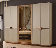 a bedroom with mirrored closet doors and furniture