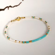 Gold filled blue miyuki delicate bracelet for women,layering dainty everyday bracelet,gold beaded bracelet,jewelry,jewellery,bohemian gift on Storenvy Minimalist Turquoise Beaded Friendship Bracelets, Minimalist Blue Heishi Beads Jewelry, Blue Minimalist 14k Gold Filled Bracelets, Miyuki Beads Bracelet, Gold Beaded Bracelet, Miyuki Bracelet, Everyday Bracelet, Rings Handmade, Diy Bracelets Patterns