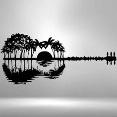 a black and white photo of an island in the middle of water with palm trees