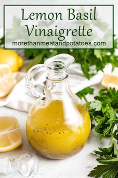 lemon basil vinaigrete in a glass bottle with parsley on the side