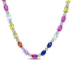 Let your vibrant personality shine through the rainbow-coloured design of this oval-shaped lab-created sapphire alternating choker necklace. Fashioned in sterling silver This choice catches the eye with an array of colorful 6.0 x 4.0mm oval-shaped lab-created sapphires. Includes: blue, orange, bright and light pink, bright and dark yellow and green Dainty round white lab-created sapphires - each artfully set to enhance size and sparkle - complete the alternating pattern. This 16.0-inch necklace Sapphire Tennis Necklace, Helzberg Diamonds, Color Lab, Peoples Jewellers, Purple Sapphire, Orange Sapphire, Tennis Necklace, Dark Yellow, Station Necklace