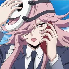 an anime character with pink hair talking on a cell phone