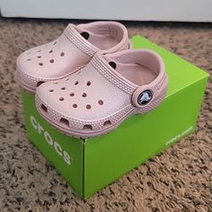 Like New With Box Infant Baby Crocs. In Great Condition. My Daughter Wore Them A Couple Times Around The House But Her Foot Is Just Too Chunky For Them. Size Is Baby/Toddler C4 . Color Is A Light Pink Shimmer. Actual Color Is Called "Pink Clay". Crocband Crocs, Toddler Crocs, Crocs Baya, Crocs Pink, Pink Crocs, Crocs Clogs, Swim Shoes, Pink Clay, Baby Alive