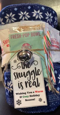 the snuggle is real gift basket with candy canes and marshmallows