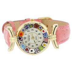 This elegant Murano Glass watch is a unique timepiece featuring high-quality workmanship and Murano's most famous glass-making technique called Millefiori. Exquisite mosaic flowers in rich summer colors adorn the handcrafted face of this watch for a stylish Venetian look that will leave everyone impressed. The beautiful and unique Murano watch adds a fine Venetian accent to any outfit and works equally well for your casual day or a dress-up evening. Measurements: The face of this Murano glass wa Luxury Pink Gold Watches As Gift, Luxury Elegant Pink Gold Watch, Cheap Trendy Pink Watches, Luxury Classic Pink Gold Watches, Luxury Pink Gold Elegant Watch, Cheap Multicolor Watches For Gifts, Cheap Adjustable Pink Watch, Unique Luxury Glass Jewelry, Luxury Pink Gold Watches With Subdials