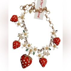 Betsey Johnson New With Tags This Is A Betsey Johnson Statement Necklace With A Strawberry Pendant That Dangles From A Gold-Plated Chain. The Pendant Is Inlaid With Rhinestones And Made Of Glass, Plastic, And Metal. The Necklace Has A Lobster Closure And Is Signed By The Brand. It Comes In Red, White, Green, And Gold Colors And Is Perfect For Occasions Such As Mother's Day, Christmas, Graduation, Anniversary, Summer, Birthday, Spring, And Valentine's Day. The Necklace Has A Fruit Lover And Islan Jewelry Queen, Character Board, Girly Accessories, Gold Colors, Summer Birthday, Jewelry Lookbook, Pretty Stuff