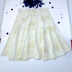 This Super-Soft, Flared Mini Skirt Features A High-Waisted, Skater Skirt Design, With A White And Gold Foil Holiday Print That Is Perfect For Day To Night And Dressing Up Any Outfit. Unlined, With Some Stretch. Style Many Ways. Exellent Condition, New And Never Worn. Fits Adults, One Size. Shown On Usa Size 8 Dress Form. Hand-Wash, Air-Dry Recommended. Sustainable Shipping, Plus Gift-Wrapping Available By Request. Ready To Ship. Features Super Soft, Flared Style. High-Waisted, Light Stretch. Whi Fitted A-line Maxi Skirt With Gathered Detail, White Relaxed A-line Skirt, Fitted A-line Maxi Skirt With Lining, White Fitted A-line Bottoms, Fitted A-line Skort, White A-line Gathered Skirt, White Stretch Knee-length Skirt, Knee-length Stretch White Skirt, Fitted A-line Summer Skirt