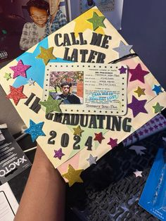 a decorated cap that reads, call me later graduating 2012 with stars on the front