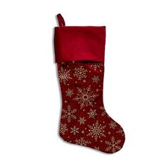 a red christmas stocking with snowflakes on it