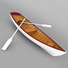 a boat with two oars is sitting on the ground and ready to be used