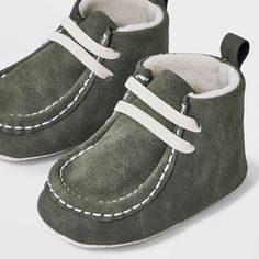 These Baby Chukka Boots - Cat & Jack™ in Green are an adorable addition to your little one’s wardrobe. Its soft shearling material for the insole with a blended polyester outsole, keeps your little one’s feet warm and cozy. With an easy pull-on feature, makes it comfortable and convenient to wear at picnics or playdates. These boots add a dash of style to every outfit. Cat & Jack™: Designed for all children so you can trust it's made for yours. Baby Winter Boots, Jack Green, Baby Green, Comfy Boot, Solids For Baby, Target Clothes, Fisherman Sandals, Brown Sneakers, Girls Sneakers