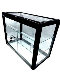 an empty glass display case with lights on the top and bottom shelves in black, isolated against a white background