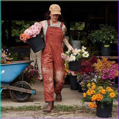 There's so many ways to wear thigh high boots! Whether you like black, leather, lace up or some added heels. These are the cutest thigh high boot outfits! Farmer Woman Aesthetic, Womens Gardening Overalls, Woman Farmer Outfit, Farm Clothing Womens, Women Farm Outfit, Duluth Gardening Overalls, Stylish Gardening Outfit, Women’s Farm Wear, Gardening Overalls For Women