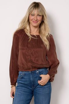 Elevate your fall wardrobe with this button-front blouse by Cloth & Stone. Finished in soft cupro-blend fabric, this chic top features a cropped silhouette with a shirred round neckline, long puff sleeves, and an elastic hem. Just add your favorite jeans and mules. | CLOTH AND STONE Women's Shirred Button Front Blouse, Size Large, Brown