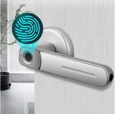 an electronic door handle with a fingerprint on it and a plant in the background