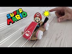 an image of a paper mario on a skateboard that is made out of cardboard