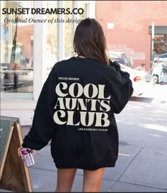 "Celebrate the unique bond of aunt-hood with our \"Cool Aunts Club Sweatshirt,\" perfect for any future aunt, new aunt, or sister-in-law. This cozy and stylish sweatshirt is an ideal gift for those recently promoted to aunt or as a thoughtful present for any member of the Cool Aunt Club. It's more than just an aunt sweater; it's a symbol of love and a fun way to show off your cool aunt status, making it a perfect choice for any aunt-related celebration or as a surprise gift.    Q U I C K * F A C T S * ✺ 50% Cotton 50% Polyester ✺Medium-heavy fabric (8.0 oz/yd² (271.25 g/m ✺ Wash and dry normally (on cool for best results)    S I Z I N G * ✺ Sizing is unisex runs true to size. ✺ We recommend selecting an item from your closet that fits well and comparing the item's measurements to the numbe Auntie And Me Outfits, Cool Aunt, Thoughtful Gift Ideas, Cute Aunt Tshirts, Cool Aunt Club, Aunt Hoodies, Auntie Sweatshirt, Favorite Aunt Shirt, Cool Aunt Sweatshirt