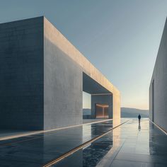 a person standing in the middle of an empty room with two walls and one door