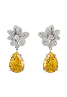 These Orchid Flower Teardrop Yellow Topaz Earrings are more than just jewellery; they're a statement of elegance. Weighing 11.0 grams, they're crafted from high-quality 925 silver, ensuring durability and lasting shine. The floral-inspired design at the top, adorned with sparkling cubic zirconia, celebrates the beauty of nature and is perfectly complemented by a teardrop-shaped lab-created yellow topaz gemstone that dangles below. Yellow topaz, the birthstone for November, is cherished for its s Yellow Flower-shaped Formal Jewelry, Formal Yellow Flower-shaped Jewelry, Formal Yellow Flower-shaped Earrings, Yellow Flower Shaped Jewelry For Formal Occasions, Topaz Earrings, Orchid Flower, Accessories Jewelry Earrings, Topaz Gemstone, Women Accessories Jewelry