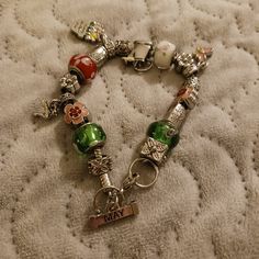 This Is New, Ordered Online So It Never Had Tags Attached, But It's In Excellent Condition, No Damages! Cute Charms That All Have To Do With The Month Of May! This Would Make A Perfect Gift!! All Charms Are In Perfect Condition, No Tarnishing, Etc! This Was Never Worn, Just Sat In One Of My Jewelry Stands For Quite Some Time!! Please Look At All Photos, Zoom In, Selling As Is! Price Is Firm Unless Bundled! Smoke Free, Pet Friendly! I Ship Same Or Next Day, Even Sunday's And Holiday's!! Cluttercore Jewelry, Funky Jewelry Silver, Mixed Metal Jewelry Stack, Madeleine Core, Thrifted Jewelry, Thrift Jewelry, Vintage Heart Jewelry, Funky Bracelet, Mint Jewelry