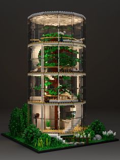 a model of a tall building with trees and plants on the outside, in front of a dark background