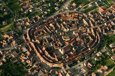 an aerial view of a city with lots of buildings