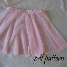 a pink skirt is laying on a white sheet with the words, pattern below it