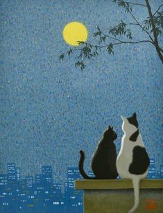 two cats sitting on a ledge looking at the moon