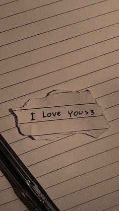 a piece of paper with the words i love you written on it