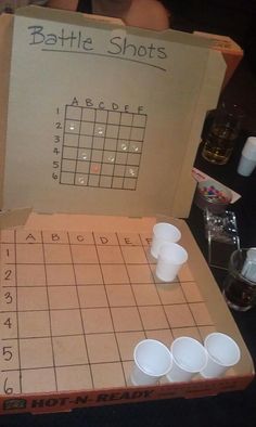 a board game with cups on it and the words battle shots written in large letters