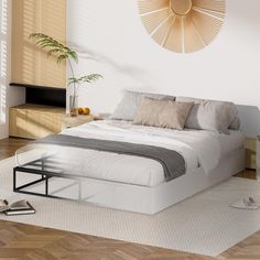 a bedroom with a bed, nightstands and a plant on the floor next to it