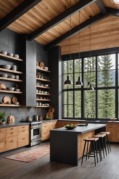 an open kitchen with wooden cabinets and black counter tops, along with lots of windows