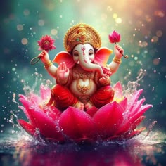 an elephant statue sitting on top of a pink flower in the middle of some water