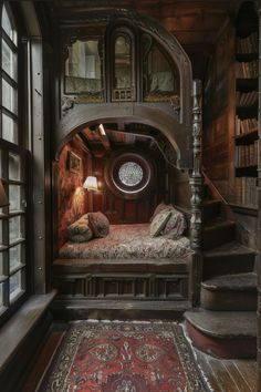 a room that has a bed in it and some books on the shelves next to it