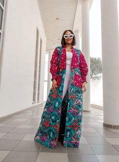 The African Print Mofi Kimono is the perfect COMBO of two prints designed to be a statement piece for your closet! It features a multicolour abstract design and is 61” in length, forming a flawless silhouette. Pair it with your favourite blue jeans and heels for a sexy day or night out on the town!   FEATURES Material is 100% African print cotton Kimono/Jacket is lined. Kimono has pockets Model is 5'7 and wore a M Disclaimer: Ace Kouture is committed to bringing you 100% REAL & Authentic African African Print Kimono Jackets, Kimono Jacket Outfit, Ankara Kimono Jacket, Kimono Styles, African Print Kimono, Printed Kimono Jacket, Nigerian Dress, Goddess Gown, Classy Gowns