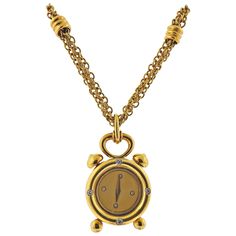 18k gold triple chain necklace, with a watch pendant. Case adorned with 4 diamonds. Necklace is 17.5" long, pendant/watch measures 35mm with bale x 20.5mm in diameter. Dial decorated with 4 diamonds. Case back marked: Etiole Geneve Swiss, M20, Gold marks. Necklace marked with Italian mark, 750. Weight - 39.5 grams. Quartz movement. Triple Chain Necklace, Gold Diamond Watch, Pearl Diamond Pendant, Gold Diamond Watches, Gold Pocket Watch, Watch Pendant, Pocket Watch Necklace, Pendant Watch, Watch Set