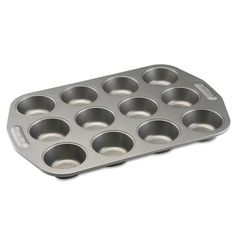 an aluminum muffin pan with nine cup holes